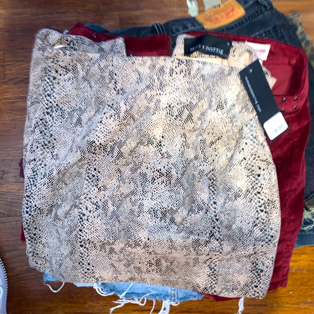 Brand new light pink snake skin skirt